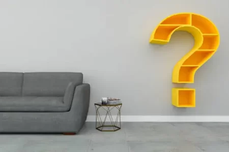 Big question mark on wall in living  room while renovating. Question problem Interior design, 3d rendering illustration. banner, space for text.Living area have sofa or armchair.